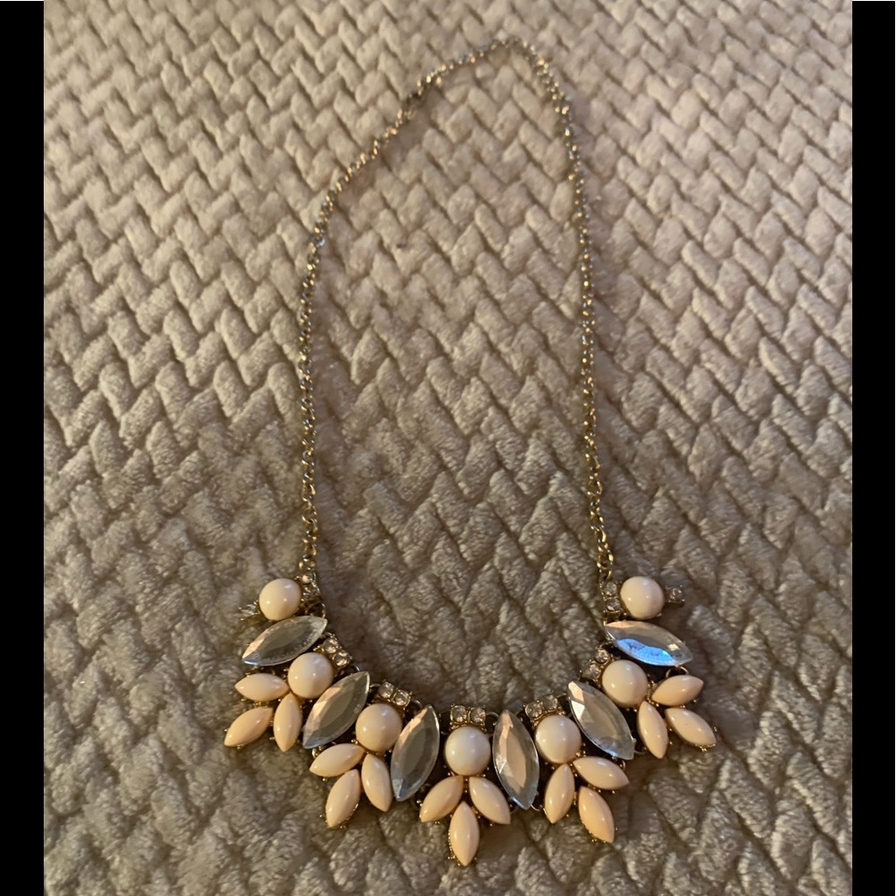 Soft pink necklace with reflective jewels